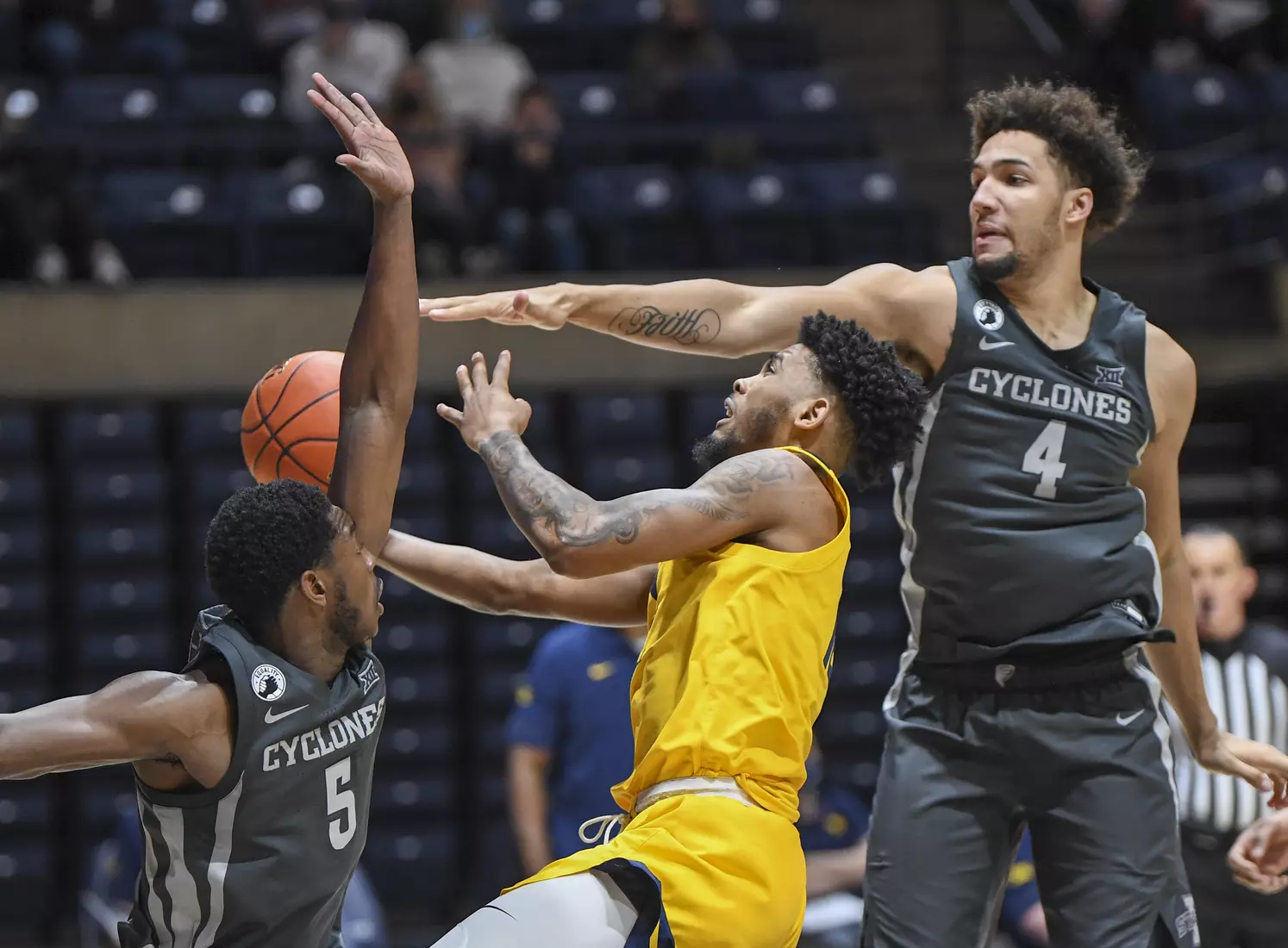 Taz Sherman drives to the basket.