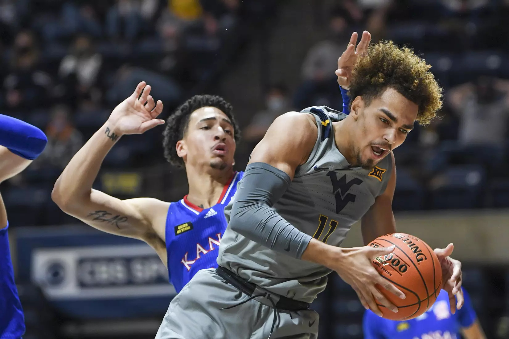 Emmitt Matthews Jr. grabs an offensive rebound.
