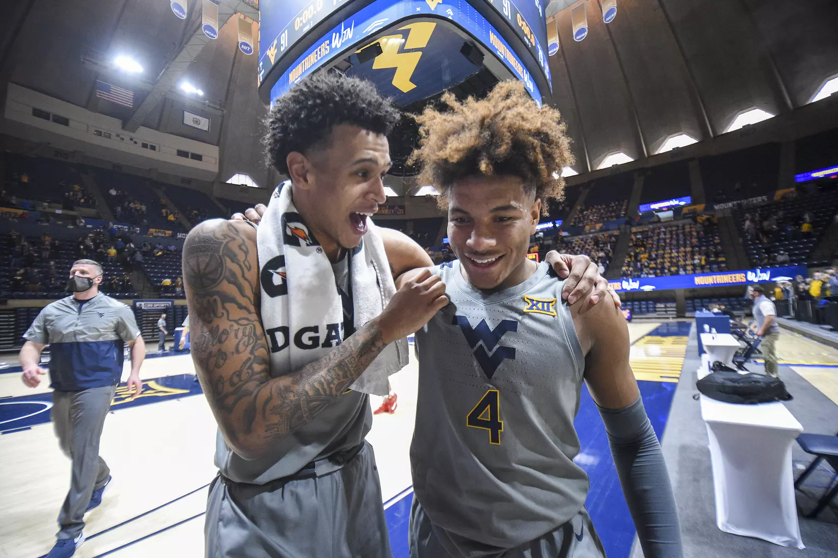 Jalen Bridges and Miles McBride celebrate the win.