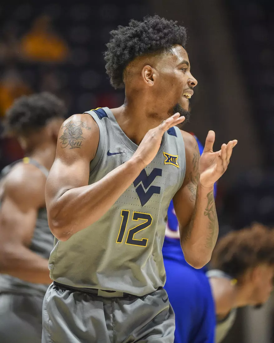 Taz Sherman celebrate a big three-pointer.