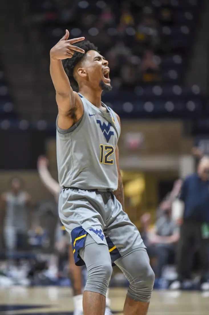 Taz Sherman celebrates a three.