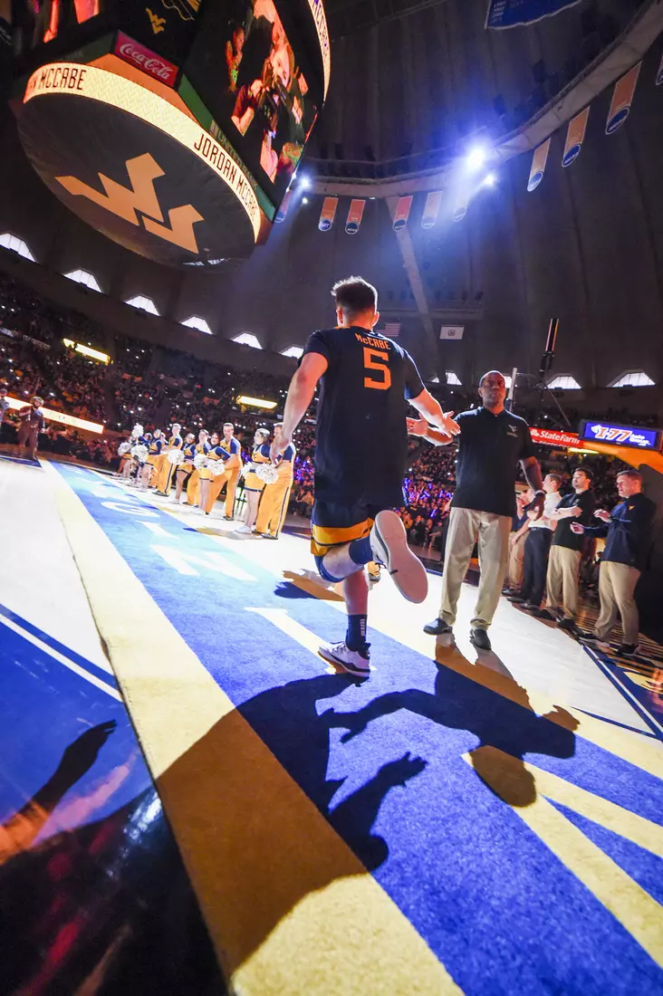 Jordan McCabe runs the carpet.