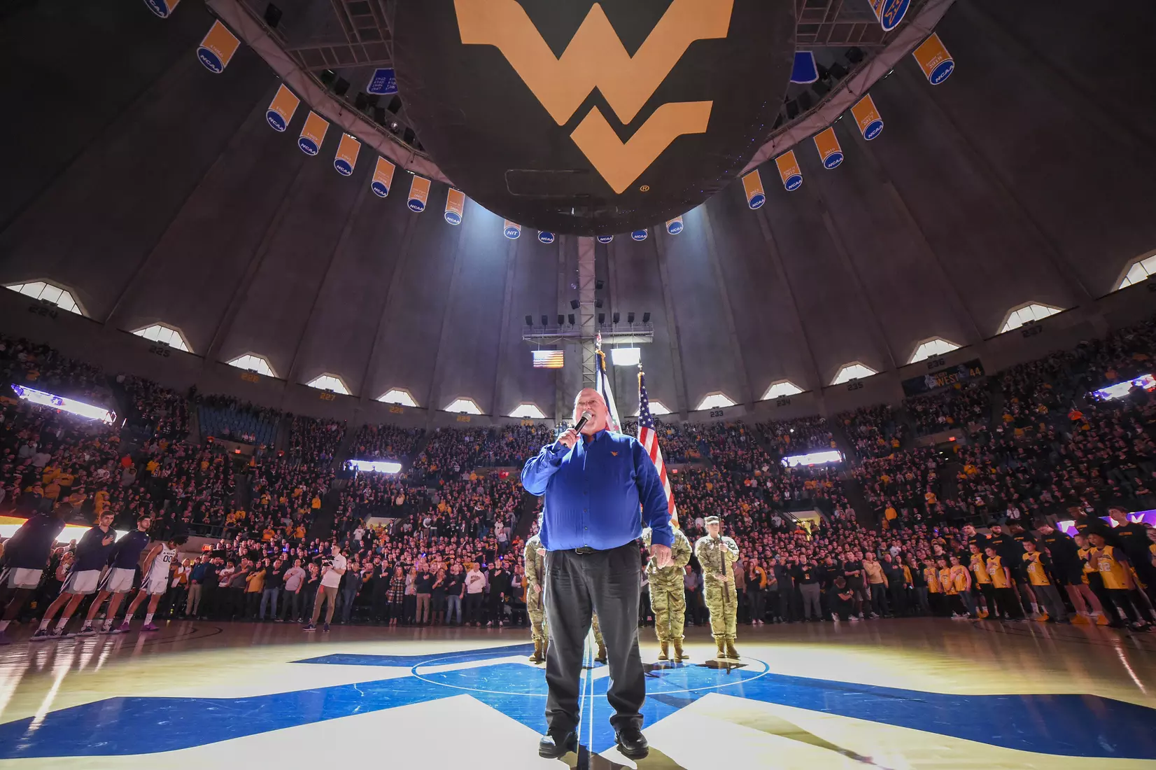Ed Lewis sings the National Anthem.