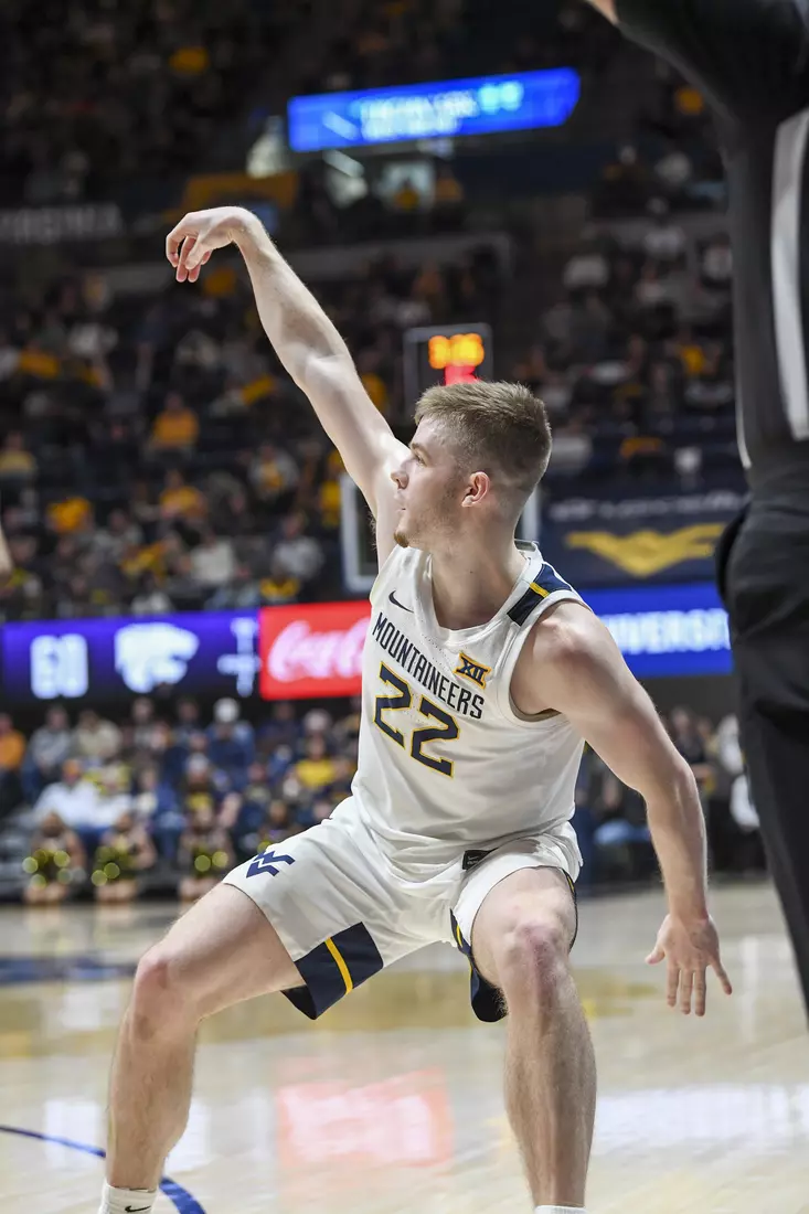 Sean McNeil holds the three-pose.