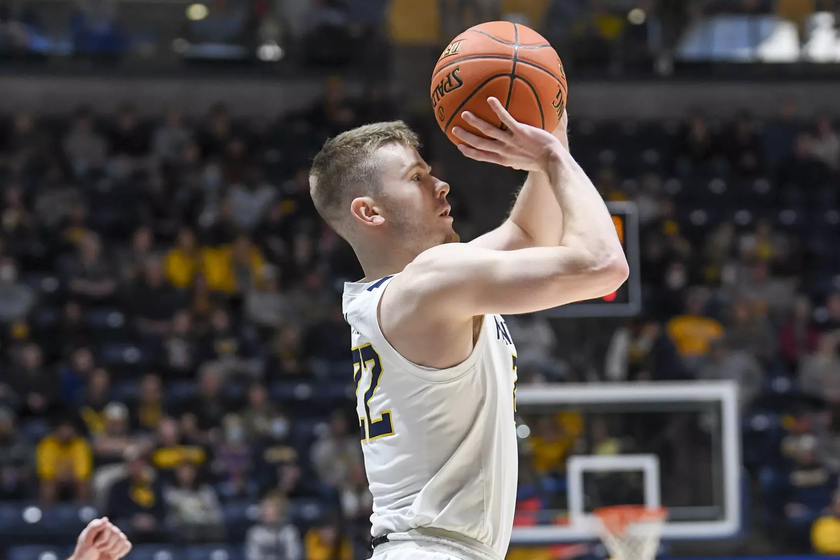 Sean McNeil hits a three.