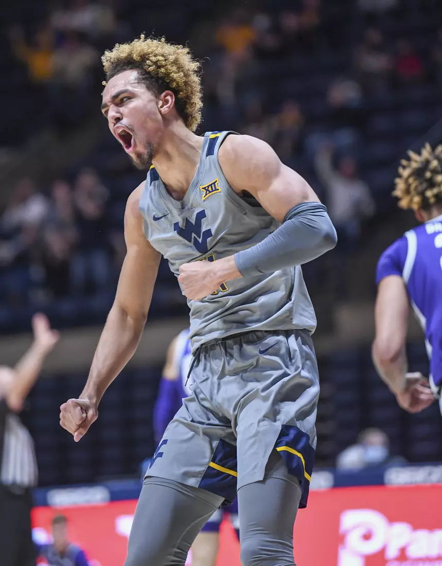 Emmitt Matthews Jr. celebrates his slam dunk.