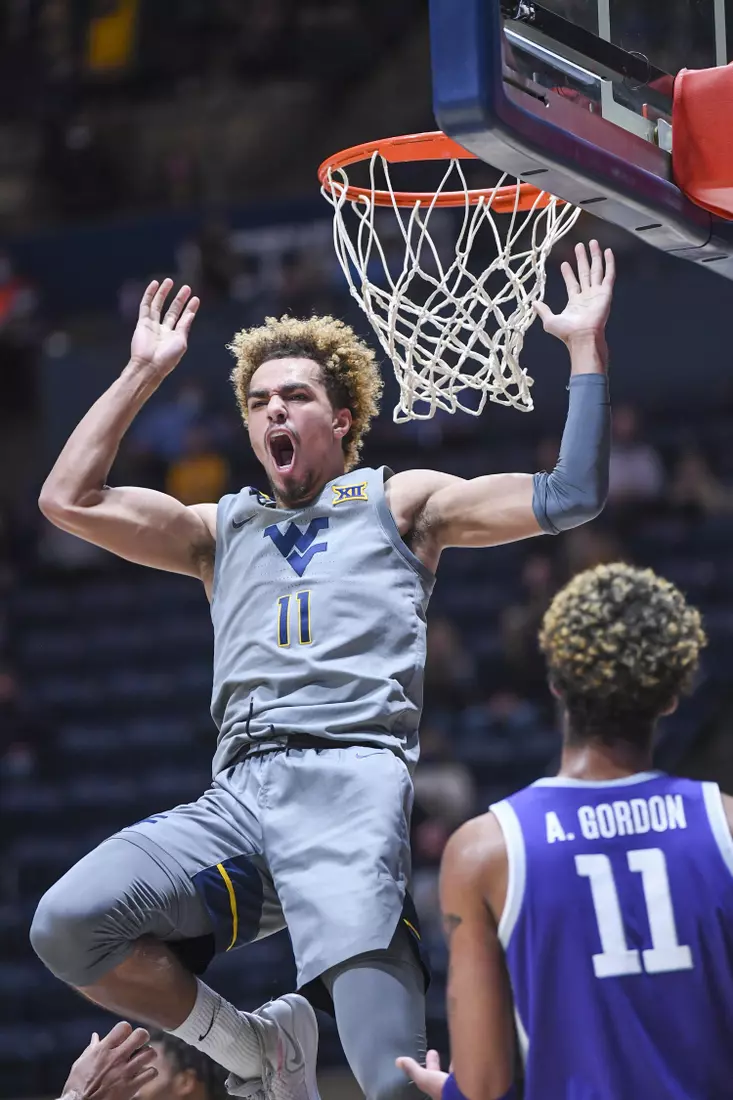 Emmitt Matthews Jr. celebrates his slam dunk.