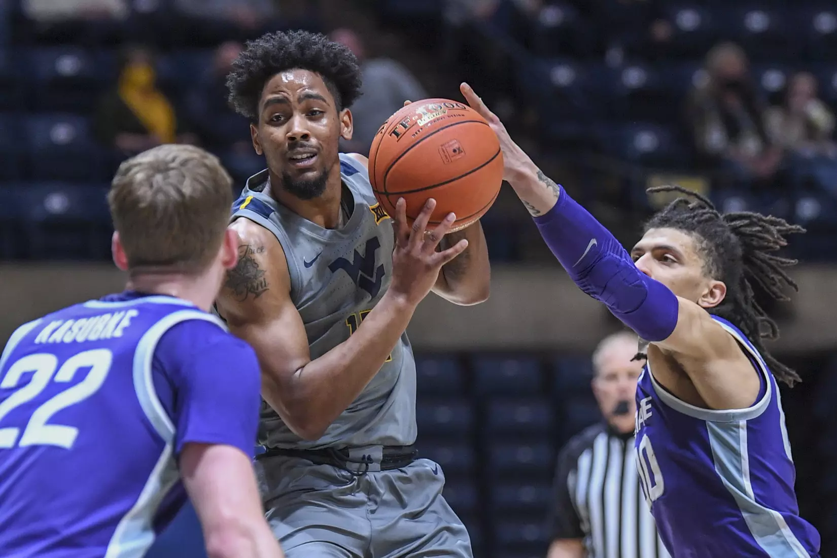 Taz Sherman drives in the lane.