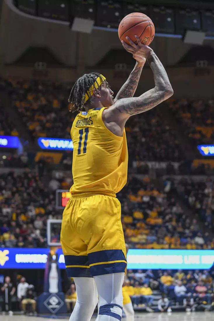 Jalen Bridges shoots for three.