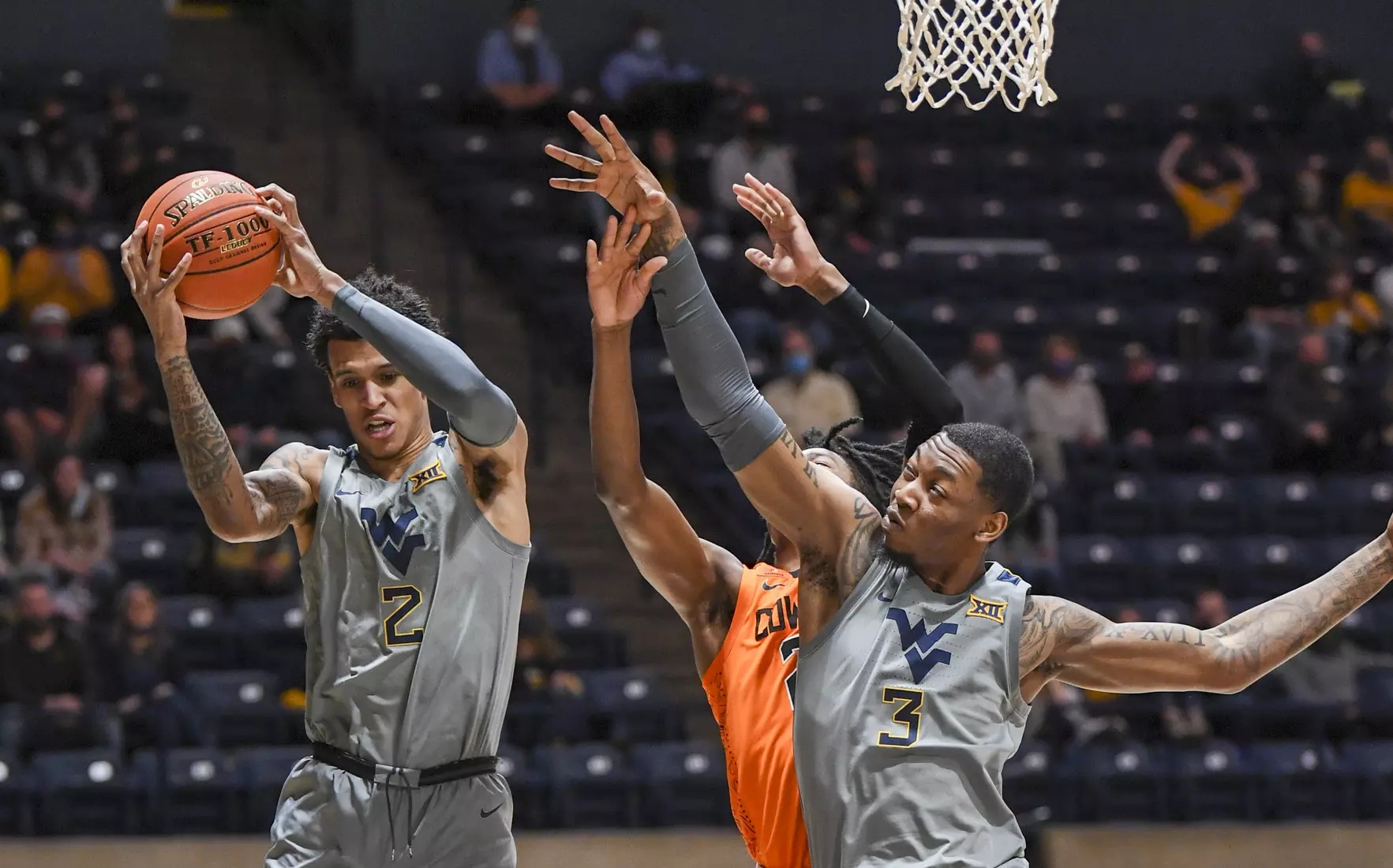 Jalen Bridges makes an offensive rebound.