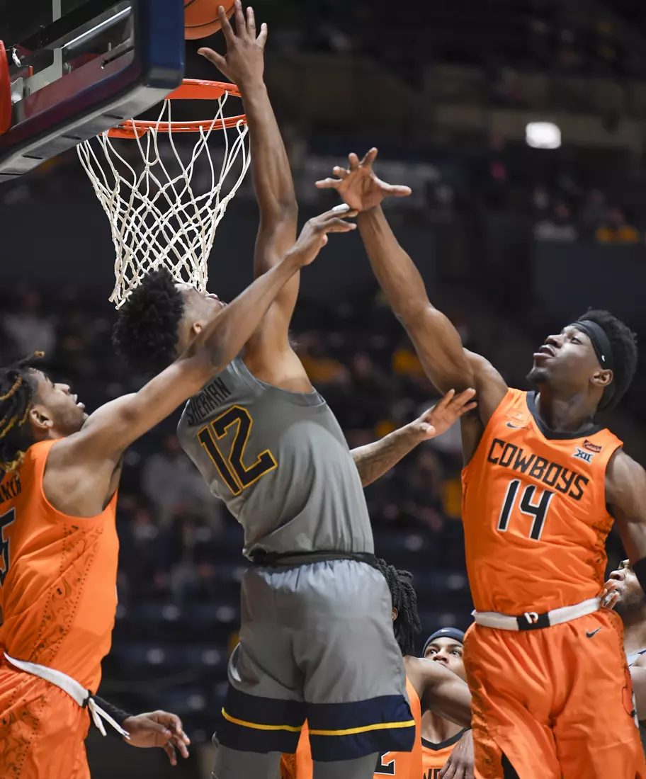 Taz Sherman makes the reverse layup.