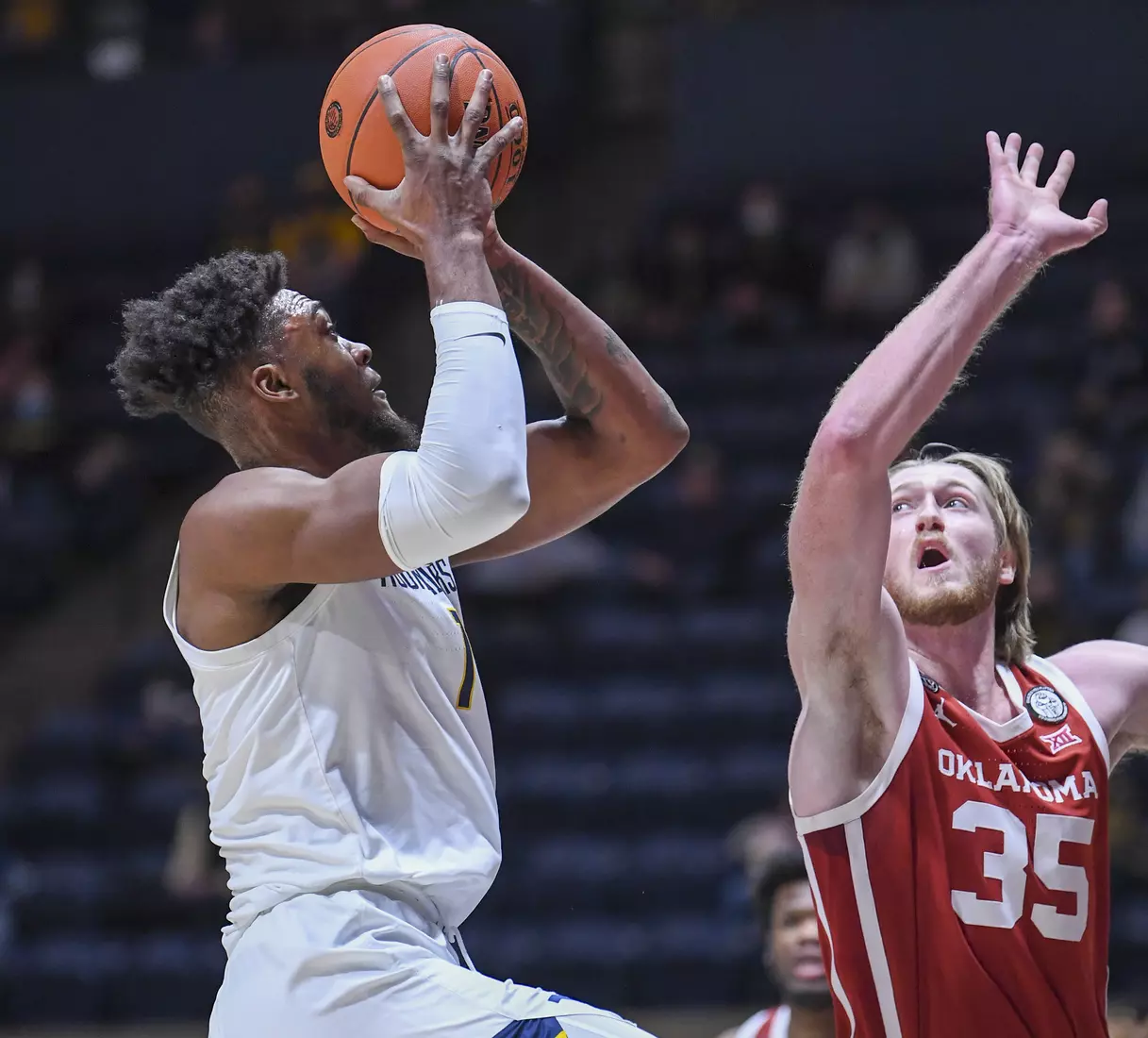 Derek Culver shoots over a defender.