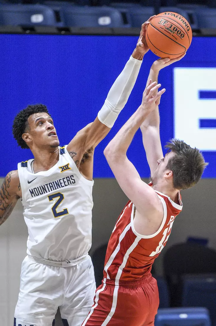 Jalen Bridges blocks a shot.