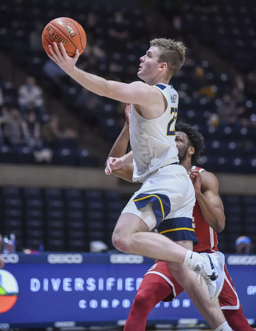 Sean McNeil drives to the basket.