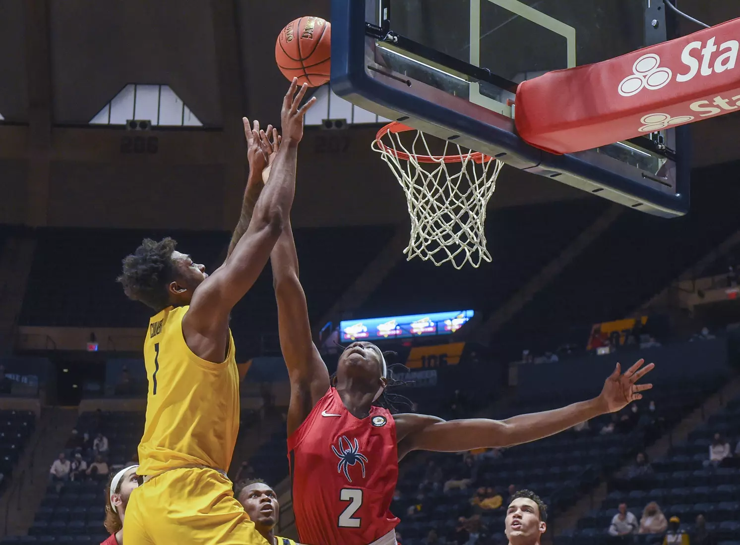 Derek Culver shoots for two points.