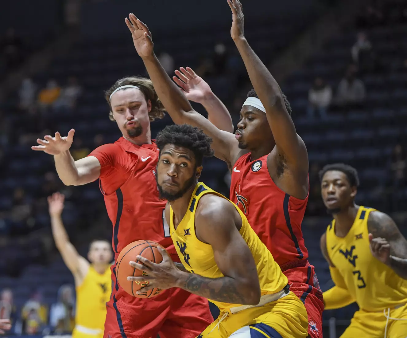 Derek Culver positions for the basket.