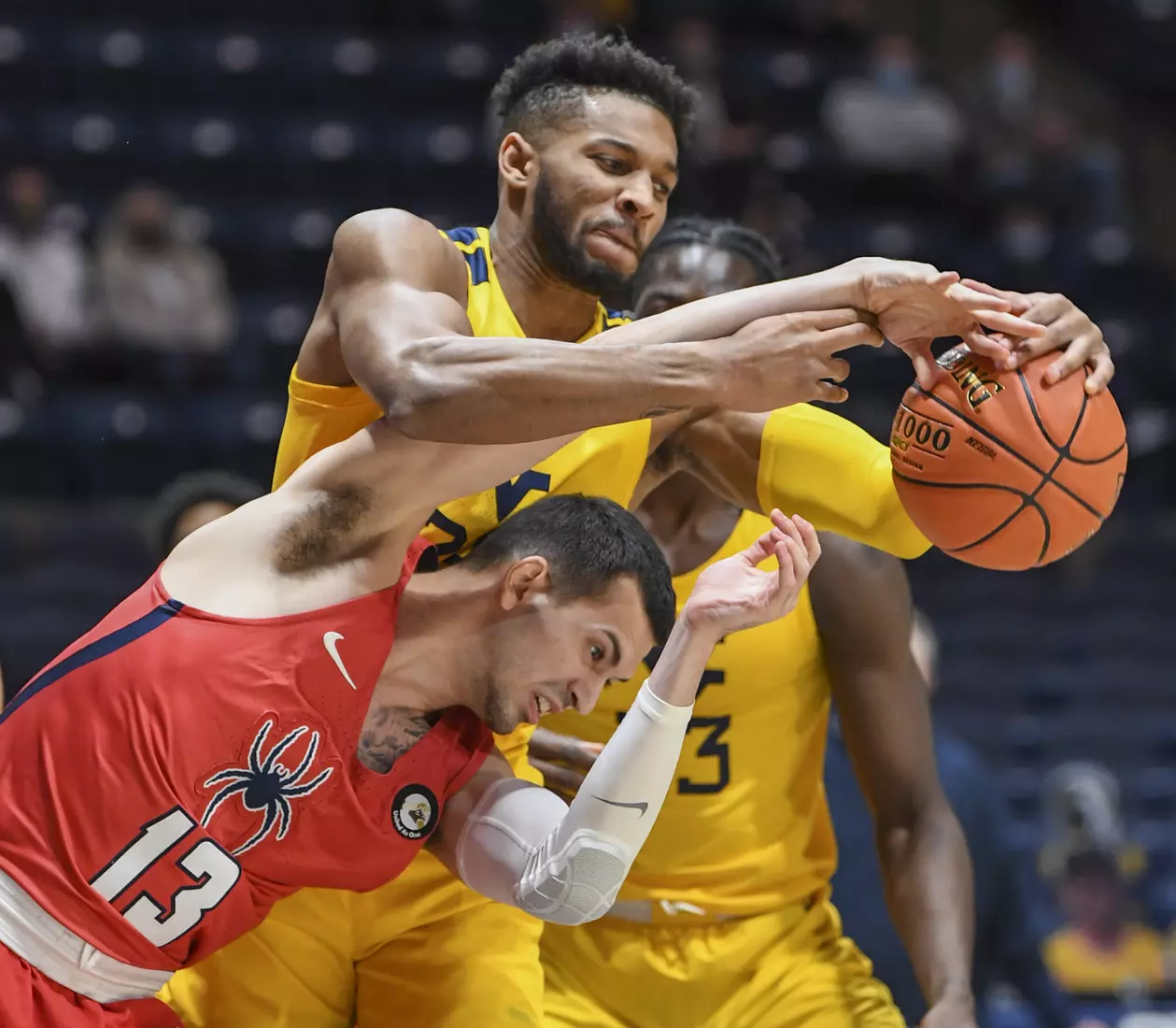 Taj Thweatt fights for a rebound.