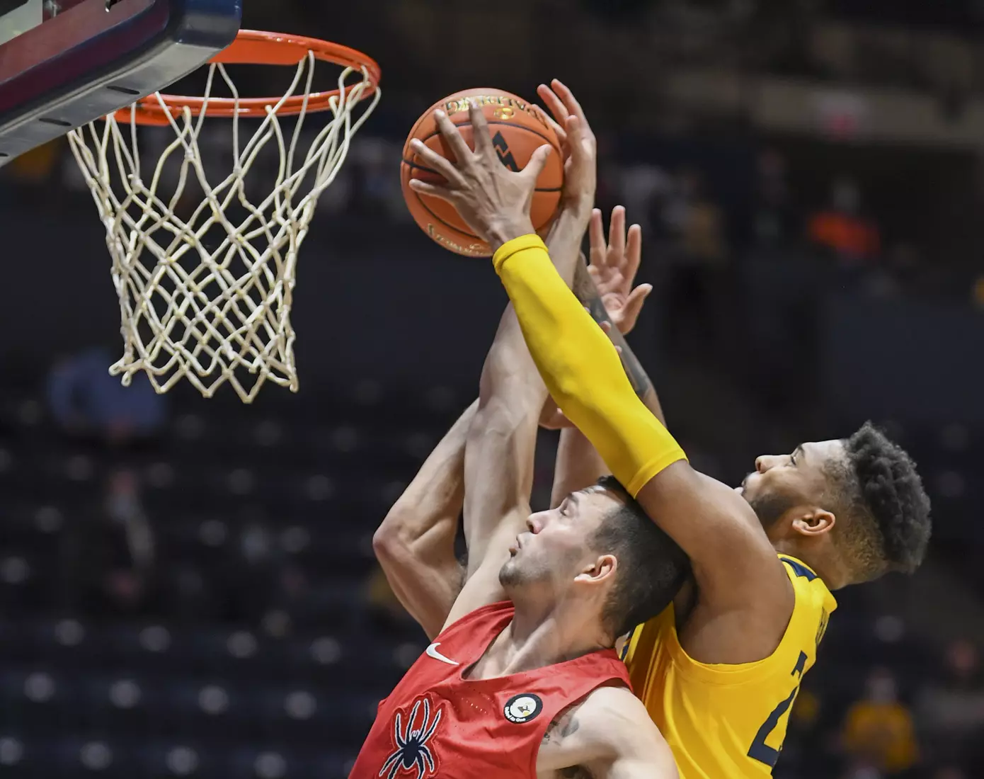 Taj Thweatt goes for a rebound.