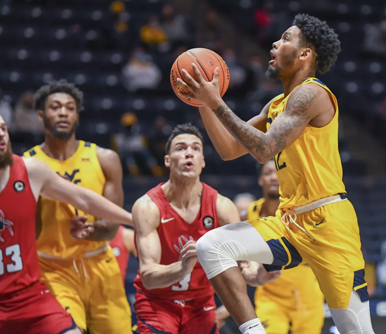 Taz Sherman on the layup.