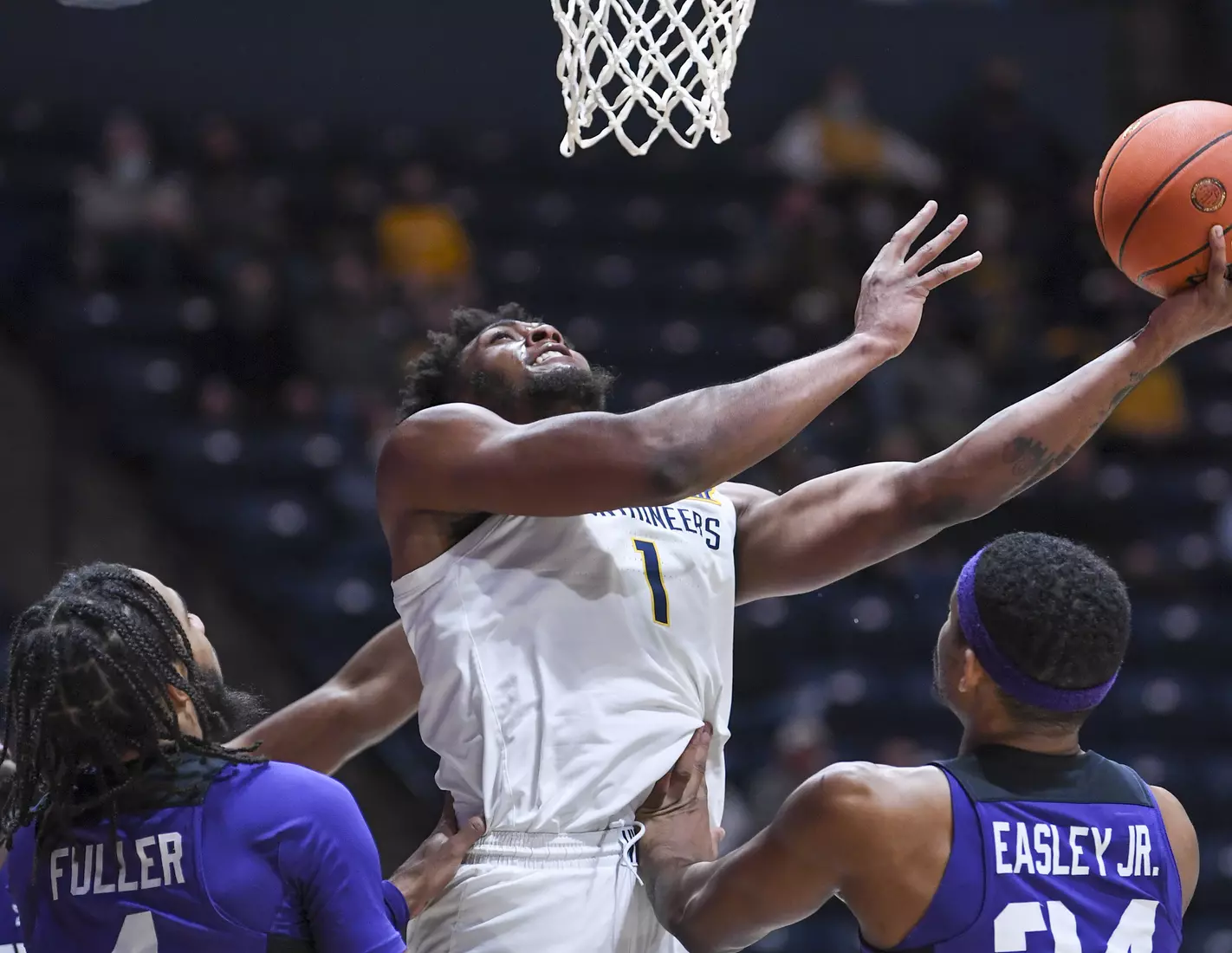 Derek Culver shoots for two points.