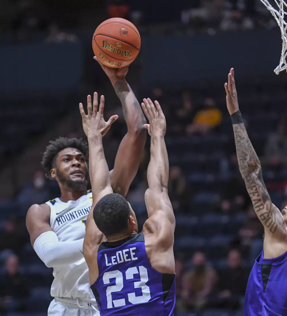 Derek Culver shoots for two points.