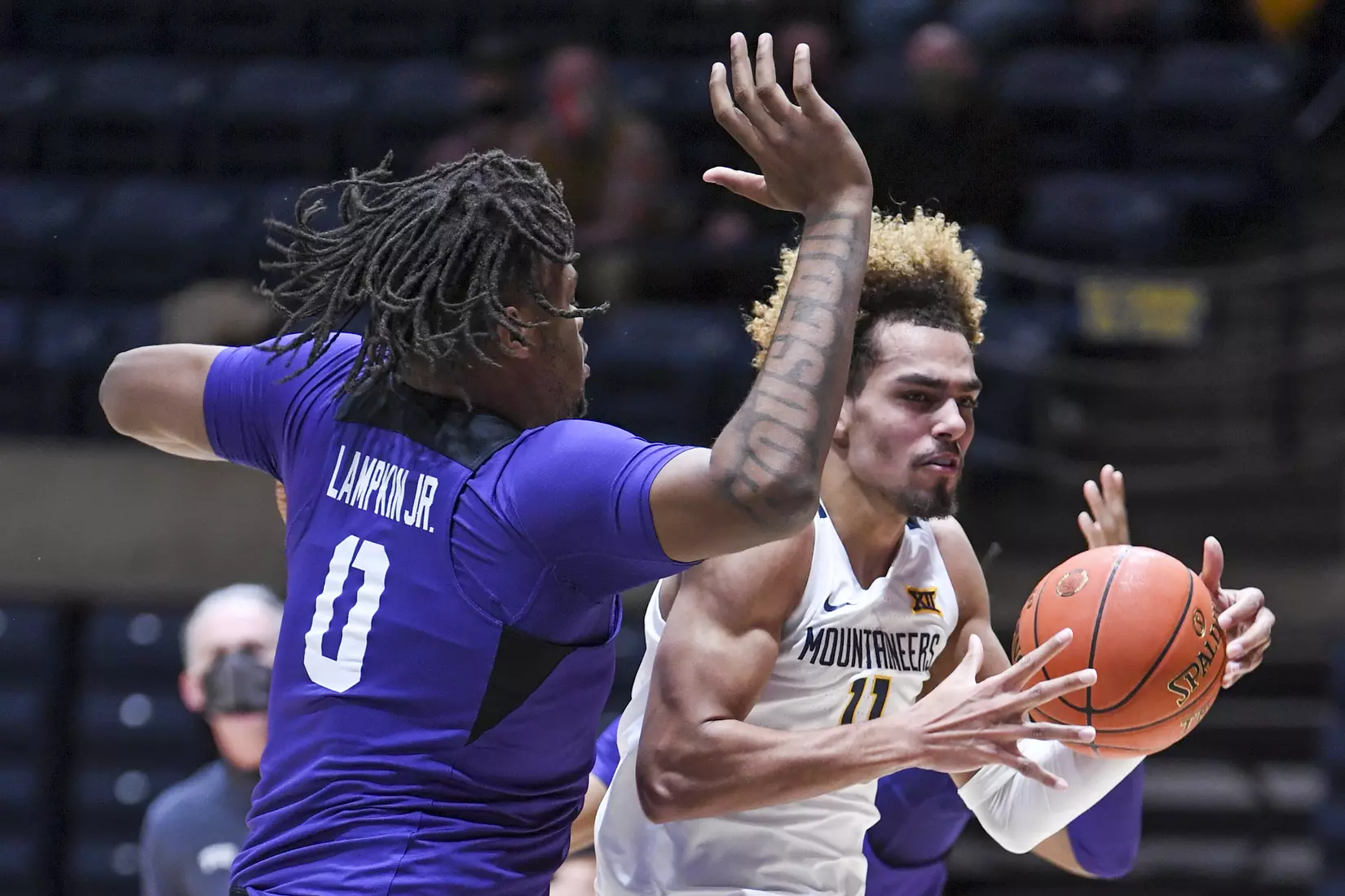 Emmitt Matthews Jr. grabs a rebound.