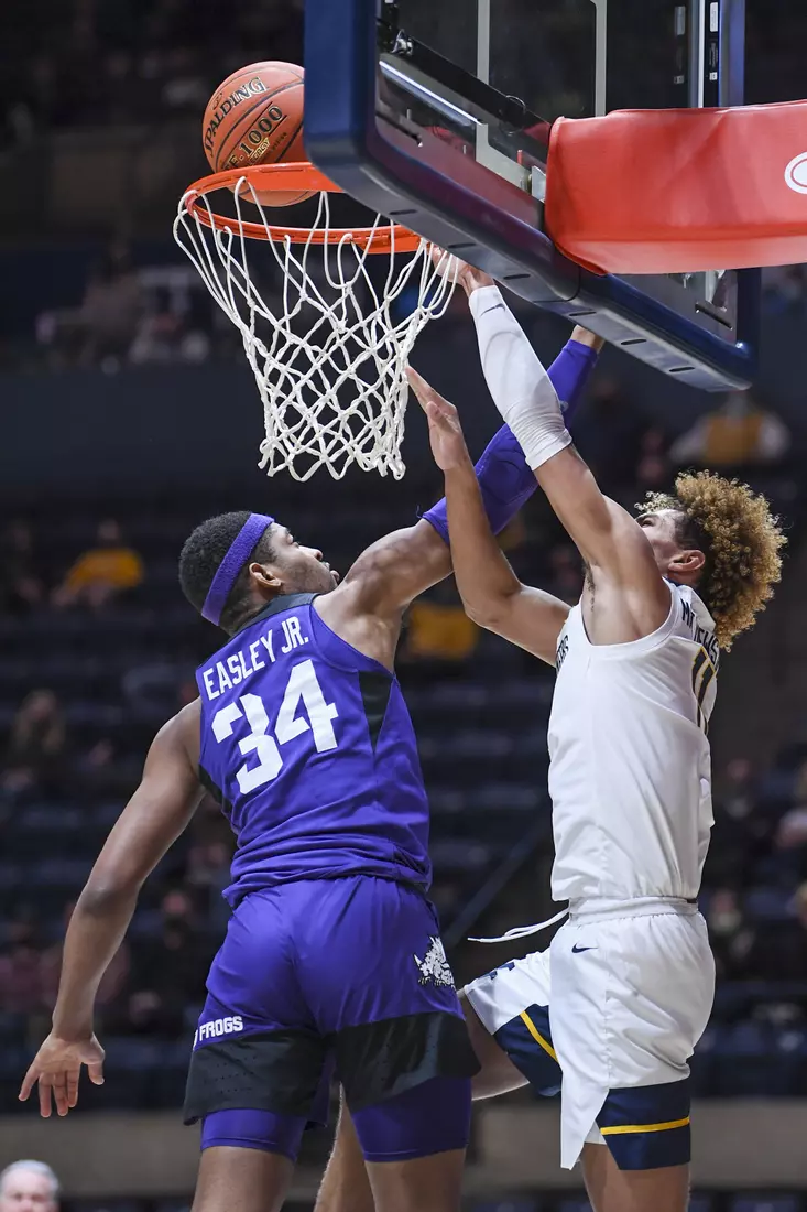 Emmitt Matthews Jr. attempts a dunk.