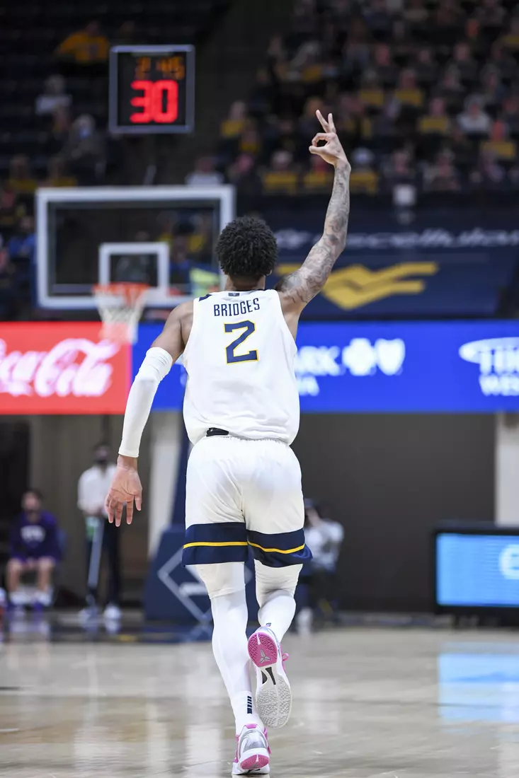 Jalen Bridges celebrates his three-pointer.