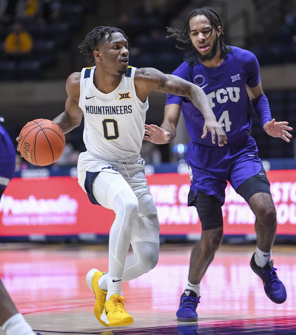 Kedrian Johnson drives.