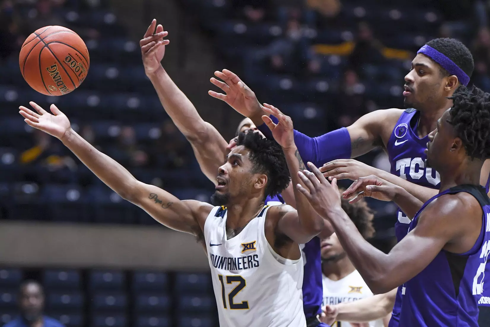 Taz Sherman fights for the loose ball.