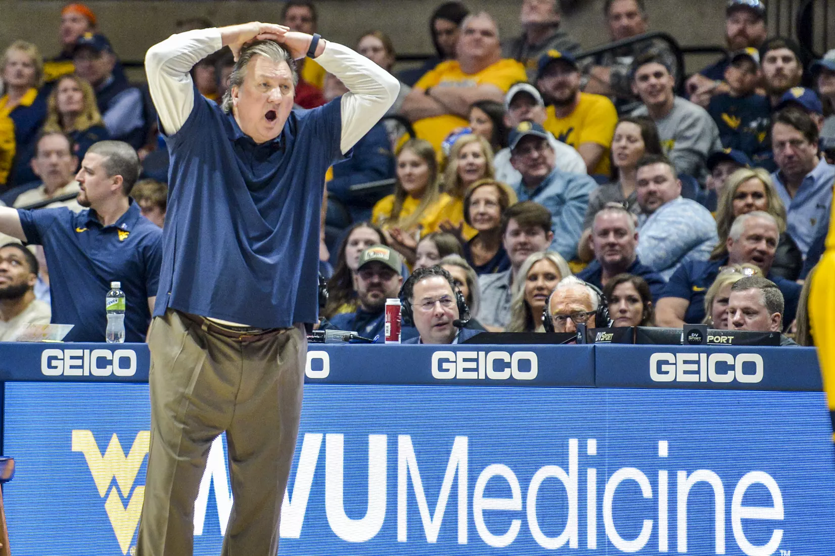 Bob Huggins reacts to an officials call.