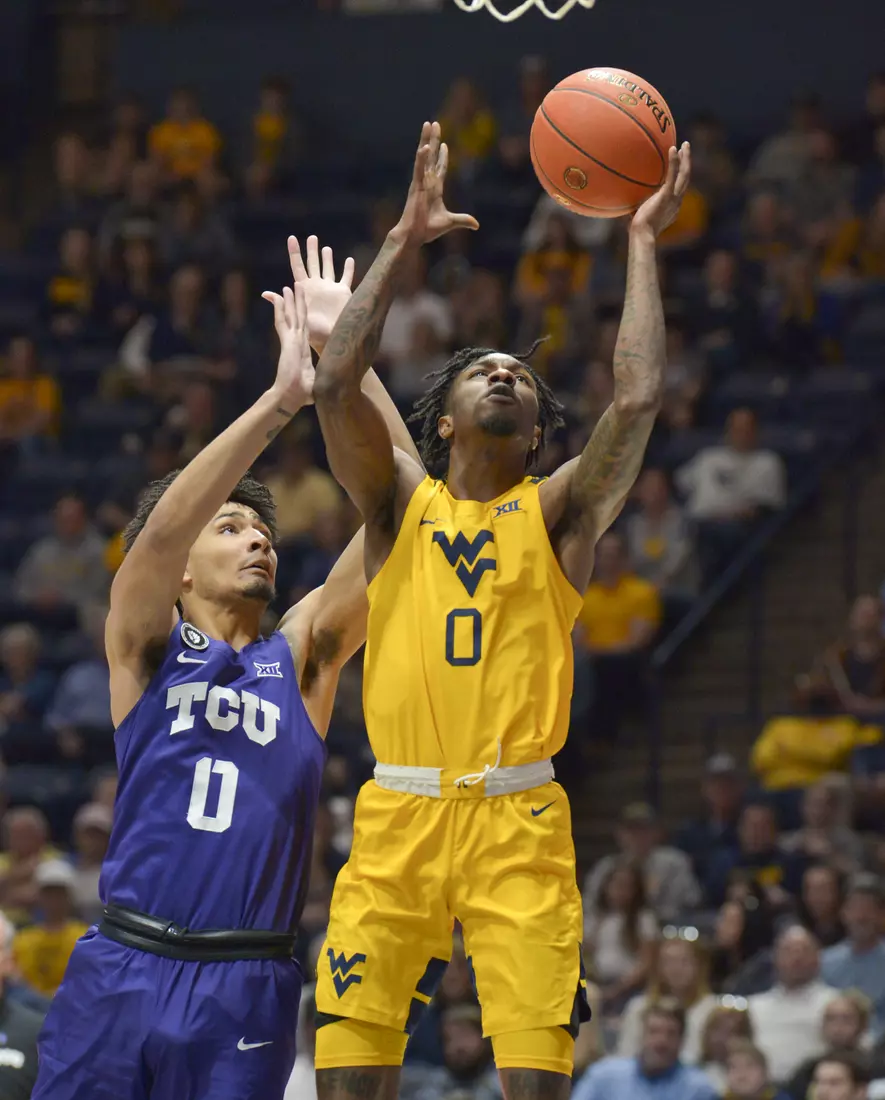 Kedrian Johnson scores.