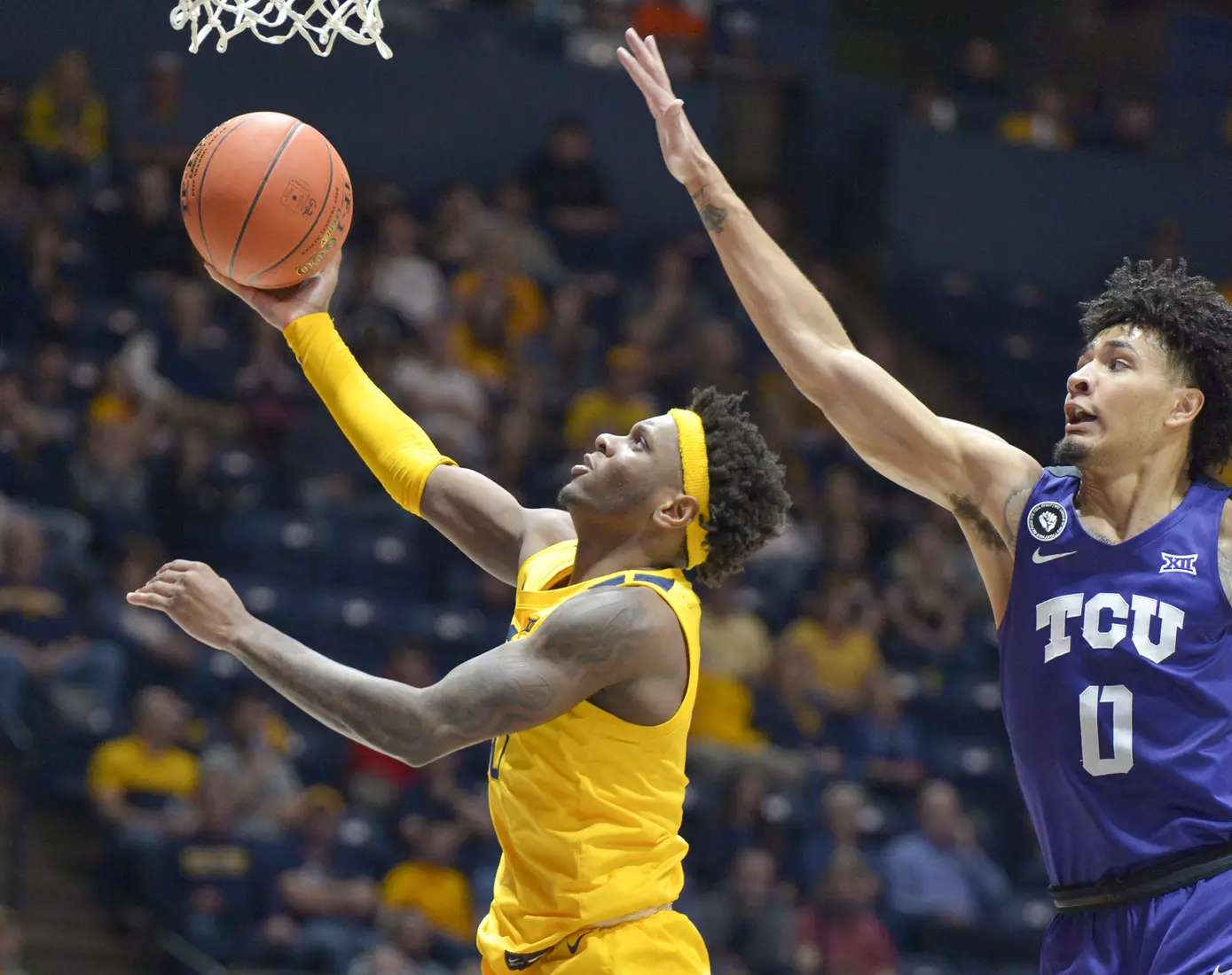 Malik Curry scores on a layup.