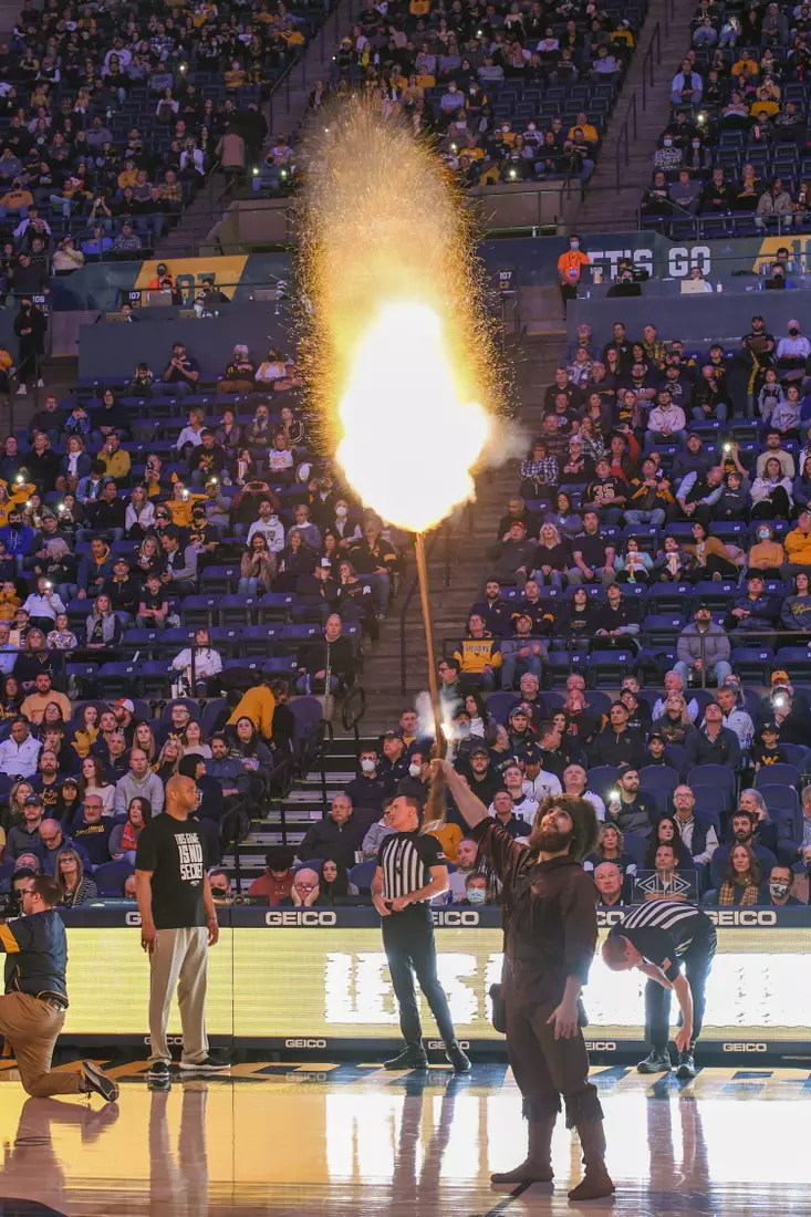 Mountaineer Colson Glover fires his musket.