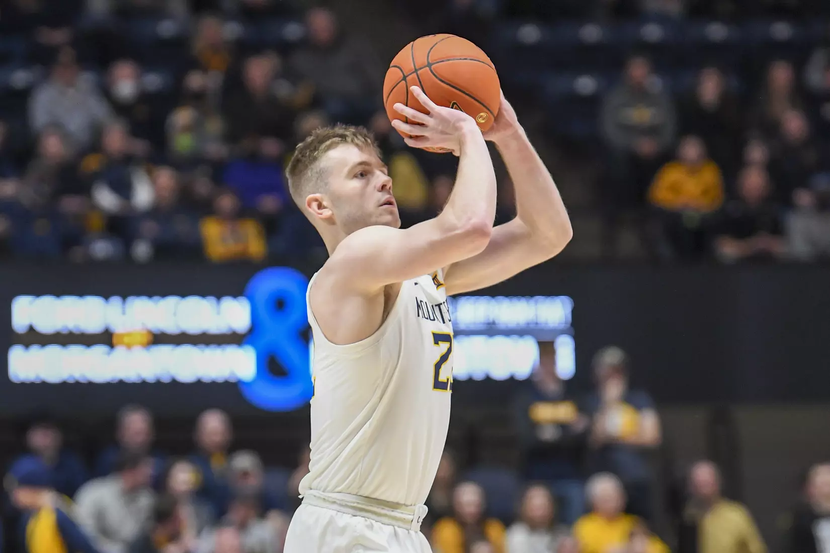 Sean McNeil shoots a three.