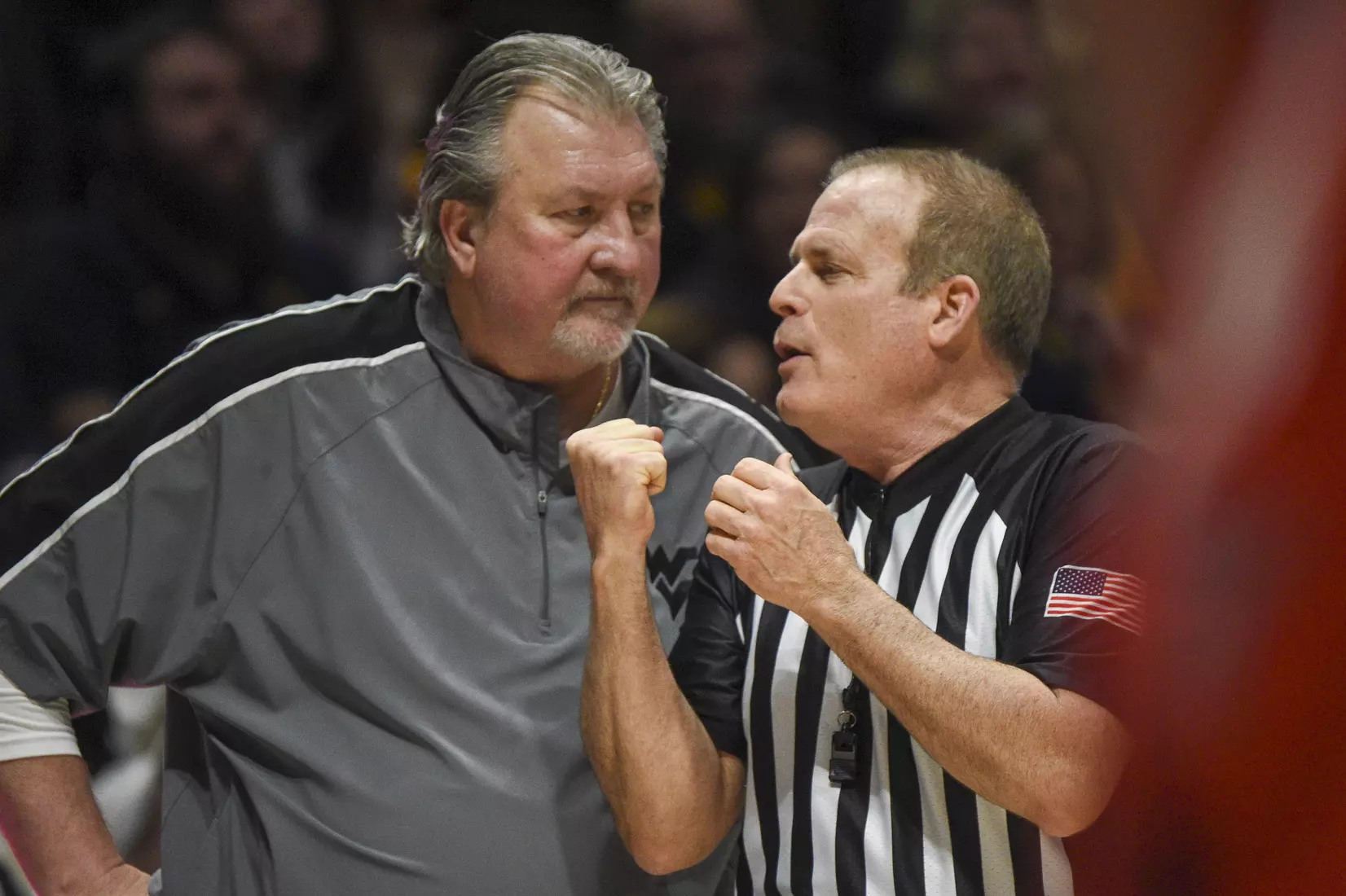Bob Huggins has a discussion with an official.