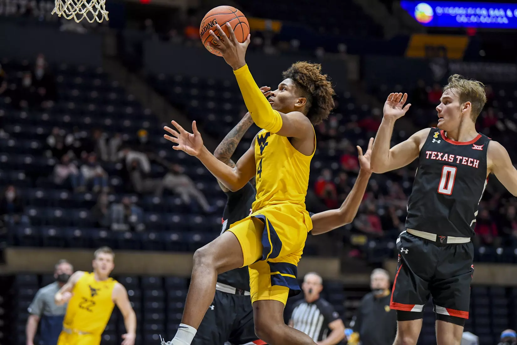 Miles McBride scores on a layup.