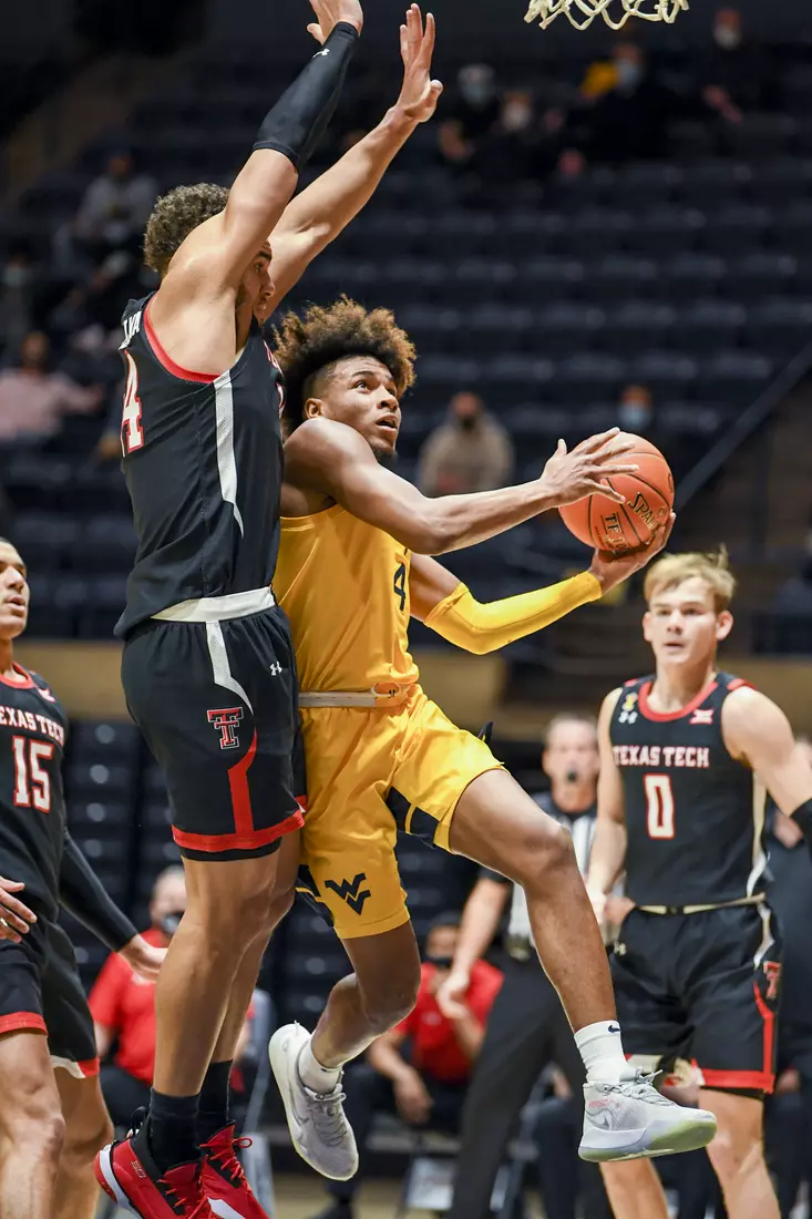 Miles McBride glides to the basket.