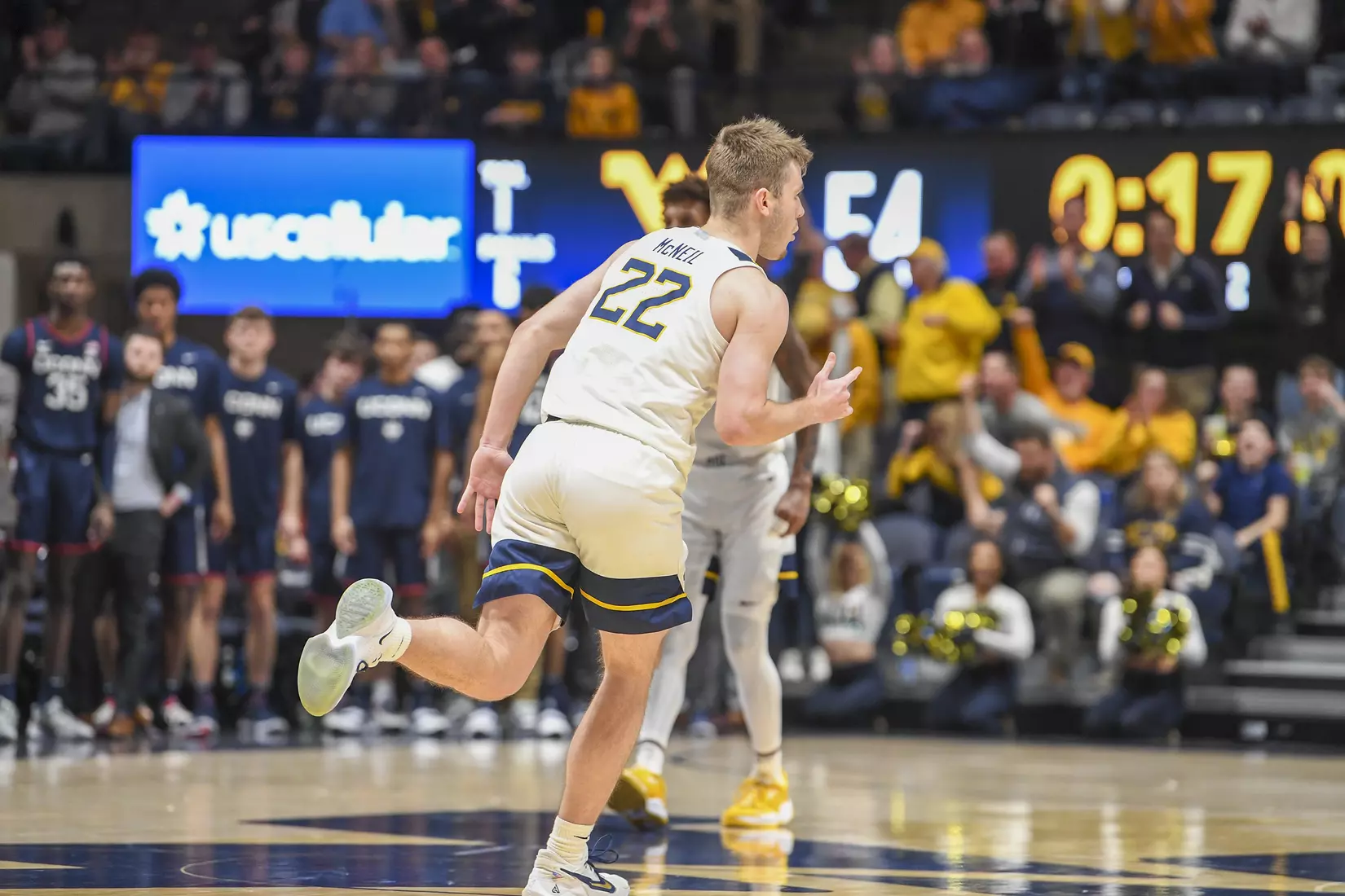 Sean McNeil celebrates his late made foul shots.