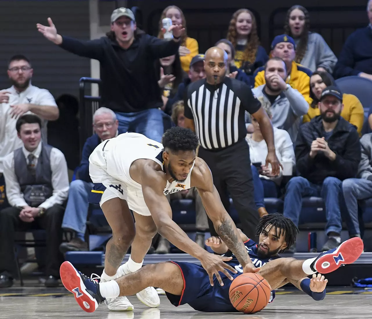 Pauly Paulicap hustles for a loose ball.