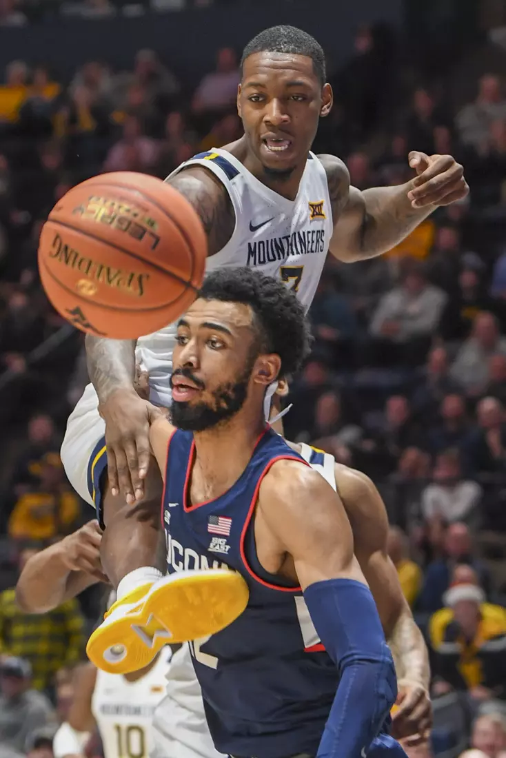 Gabe Osabuohien jumps high for a loose ball.