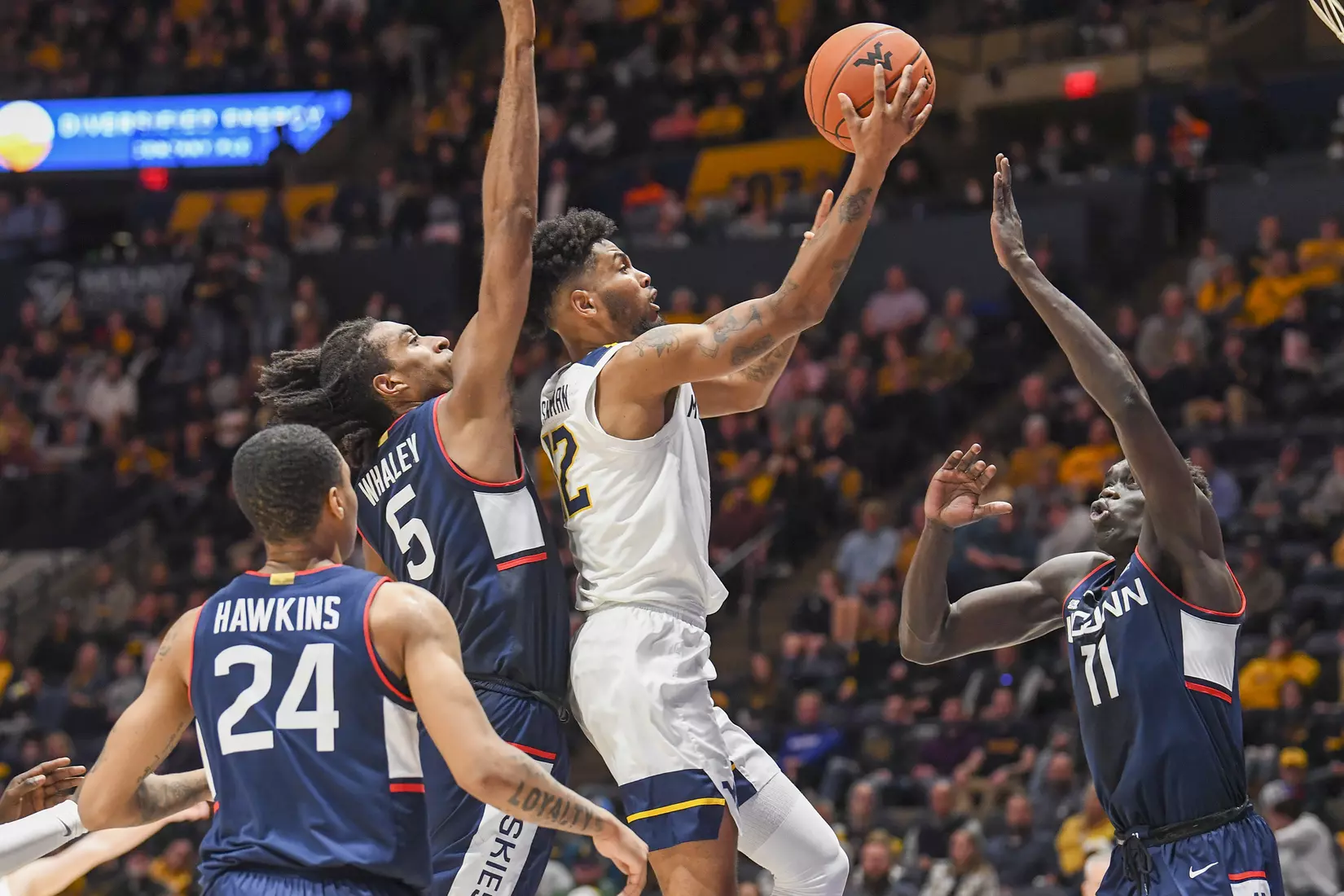 Taz Sherman glides through the lane for two points.