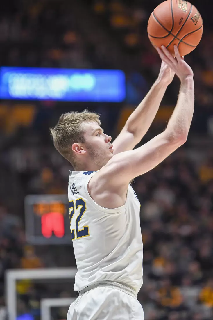Sean McNeil shoots a three.