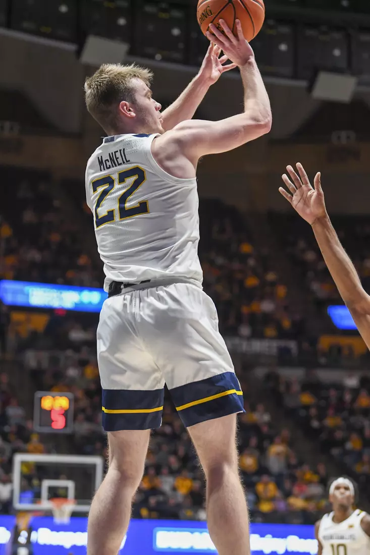 Sean McNeil hits a three.