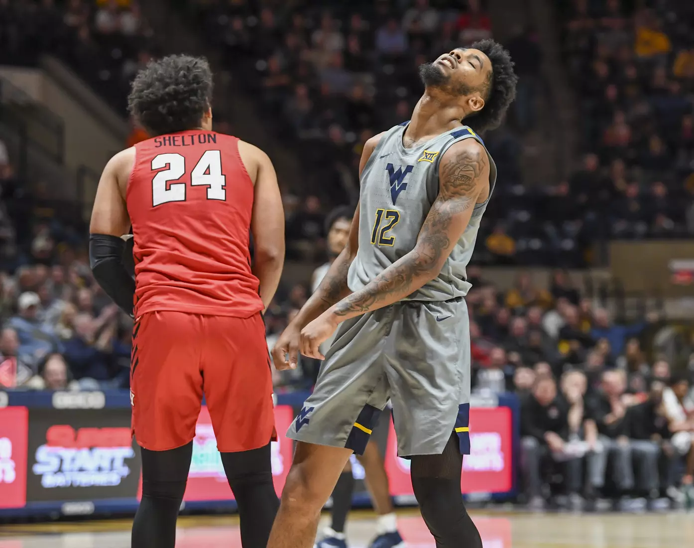 Taz Sherman reacts to the basket and foul.