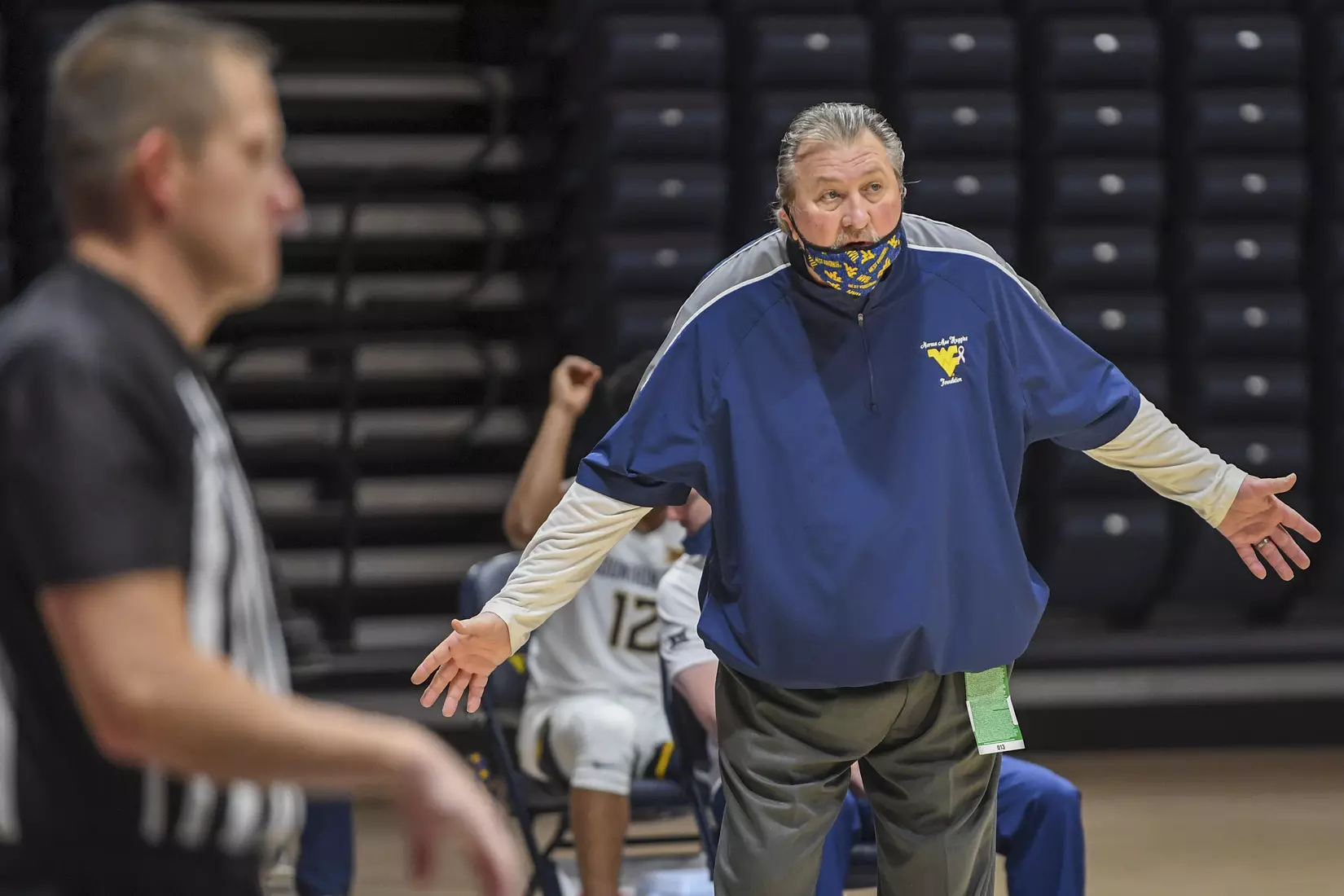 Bob Huggins looks for a call.