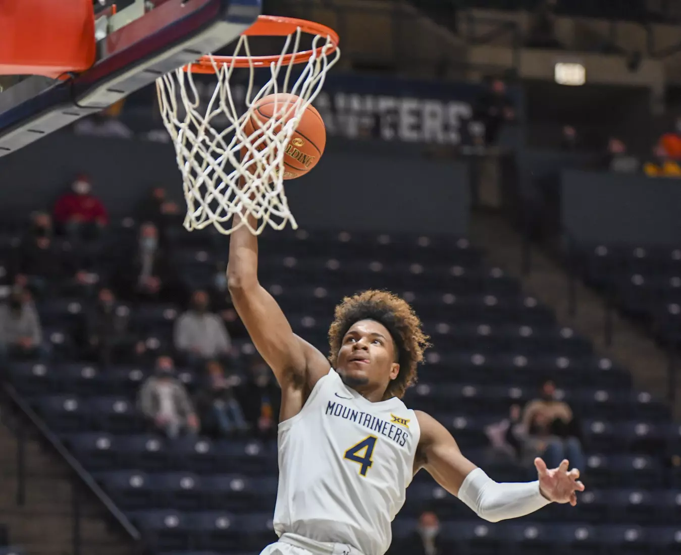 Miles McBride slams for two.