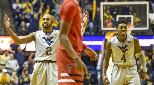 Jevon Carter and Daxter Miles Jr.
