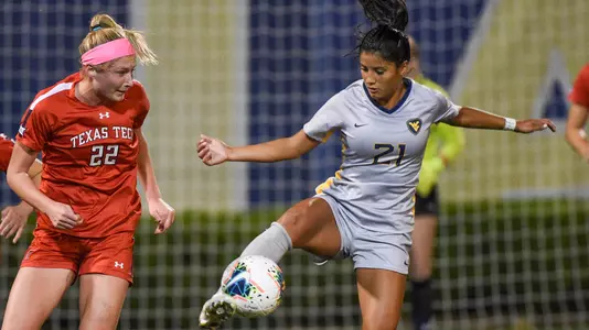 Stefany Ferrer-vanGinkel plays defense.