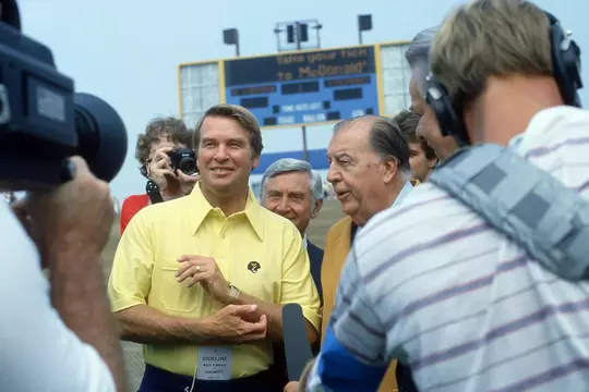West Virginia coach Don Nehlen and US Senator Jennings Randolph during the Mountaineer Field stadium dedication ceremony prior to the Mountaineers' game against Cincinnati in 1980.